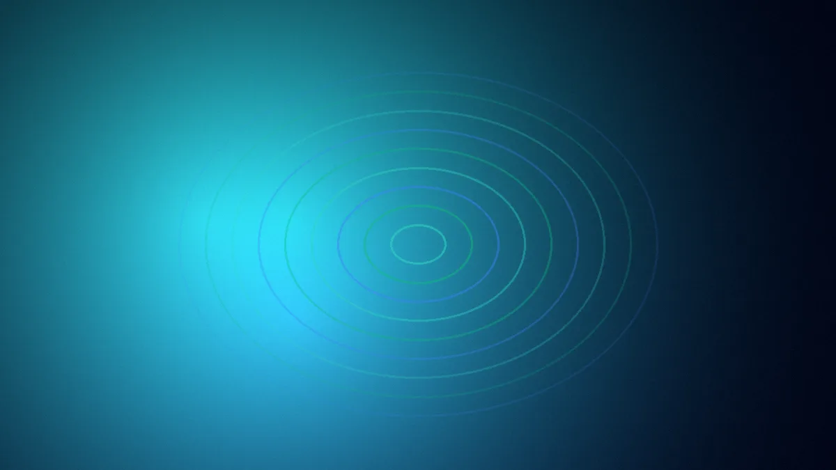 A single teal circle of light expanding in still dark water, calm and symmetrical.